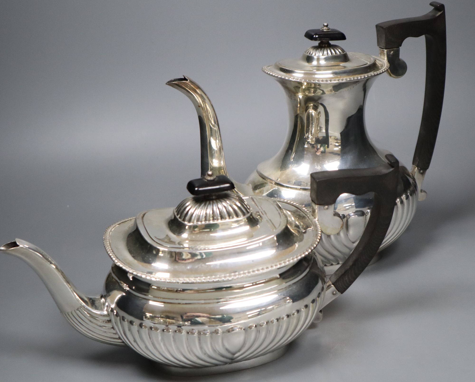 A modern demi fluted silver four piece tea and coffee service, by Viners Ltd, Sheffield, 1963,